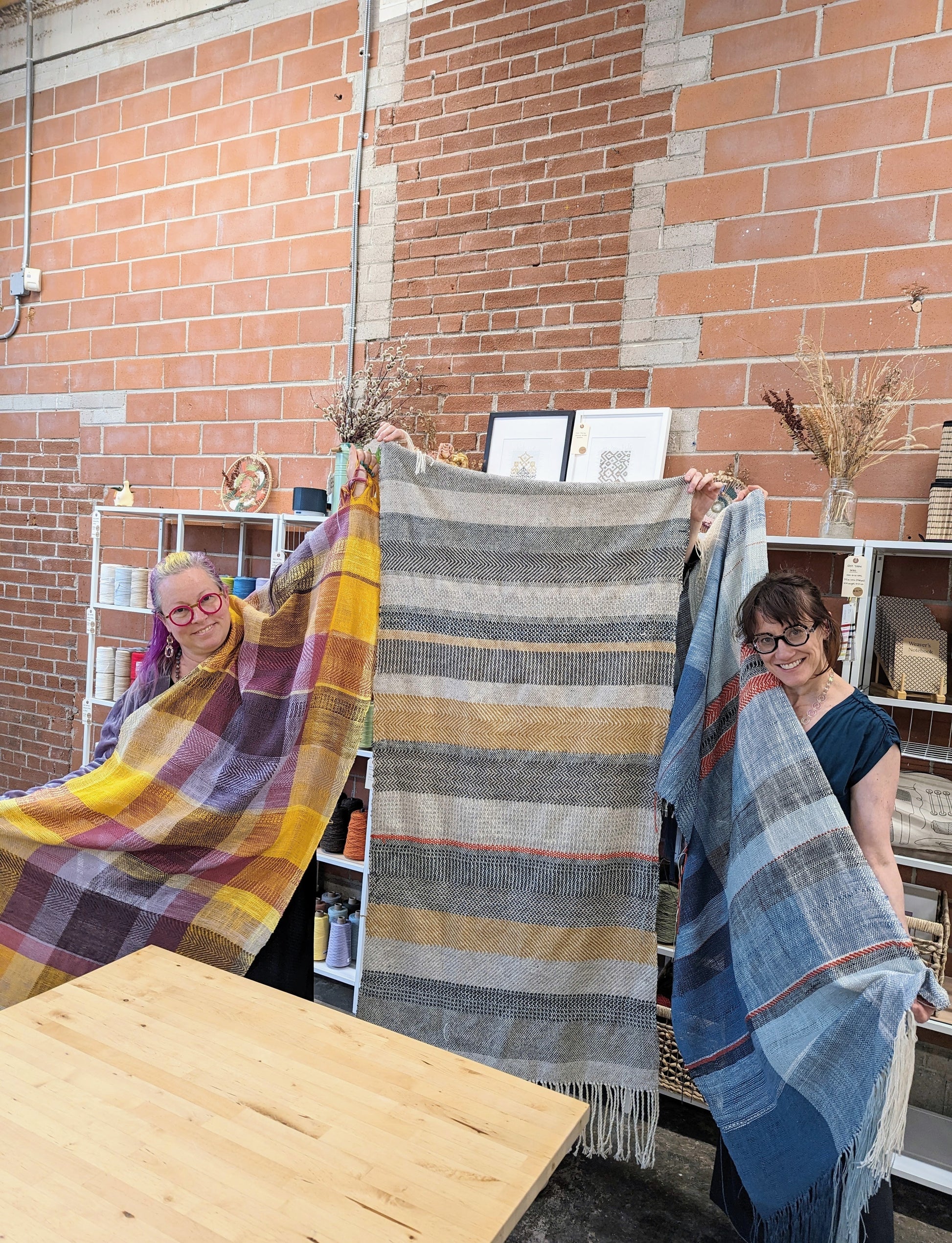 Student with handwoven shawl
